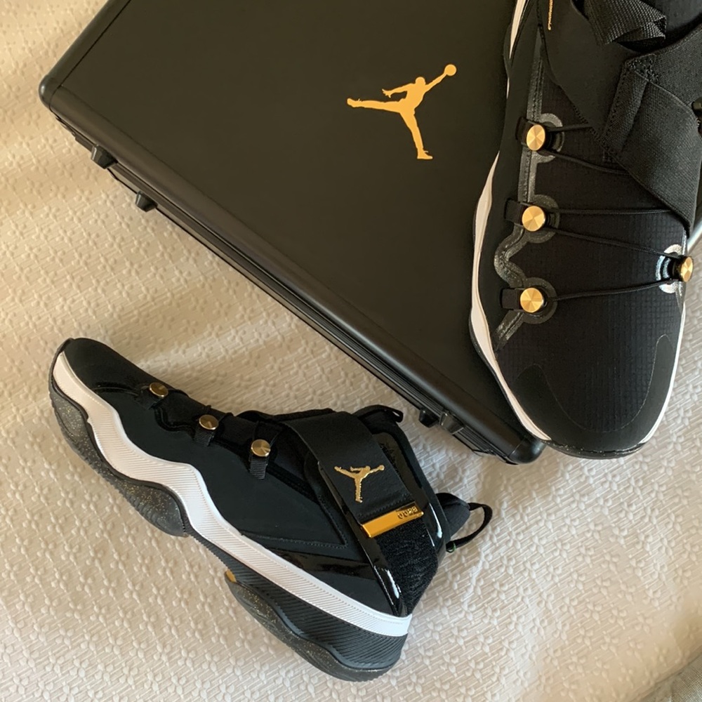 Jordan AJNT23 Black Metallic Gold with Suitcase. Size 12 NWT